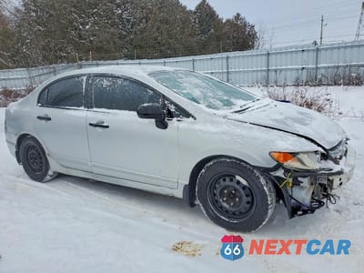Czwarte zdjęcie samochodu z boku: 2006 HONDA CIVIC DX VP VIN:2HGFA16326H012767 - miniatura
