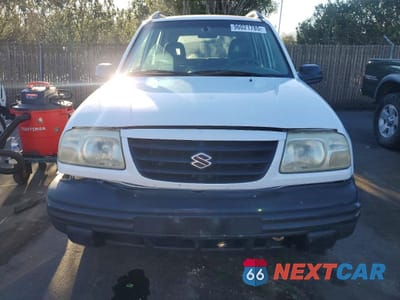 Piąte zdjęcie samochodu w środku: 2004 SUZUKI VITARA LX VIN:2S3TD62V046100952 - miniatura