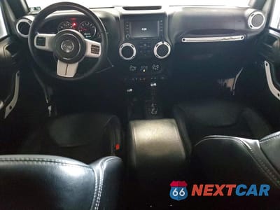 Zdjęcie 8 z 12 samochodu: 2015 JEEP WRANGLER UNLIMITED SAHARA VIN:1C4BJWEG1FL643527 - miniatura