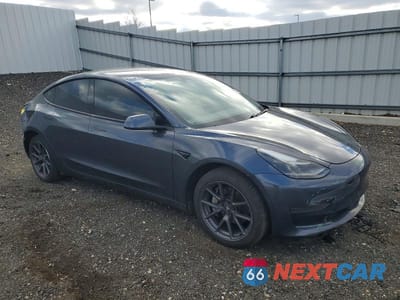 Czwarte zdjęcie samochodu z boku: 2021 TESLA MODEL 3 VIN:5YJ3E1EA6MF075413 - miniatura