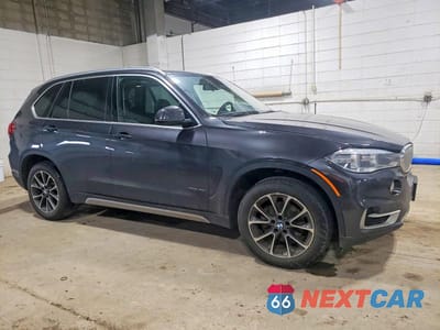 Czwarte zdjęcie samochodu z boku: 2016 BMW X5 XDRIVE35I VIN:5UXKR0C52G0U07882 - miniatura
