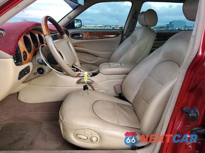 Zdjęcie 7 z 12 samochodu: 2000 JAGUAR VANDENPLAS VIN:SAJDA24C6YLF18742 - miniatura