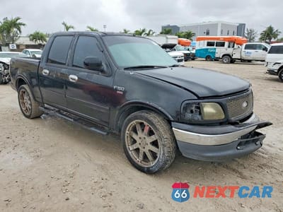 Czwarte zdjęcie samochodu z boku: 2001 FORD F150 SUPERCREW VIN:1FTRW07L21KC60105 - miniatura