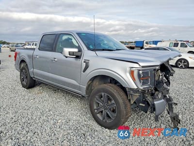 Czwarte zdjęcie samochodu z boku: 2023 FORD F150 SUPERCREW VIN:1FTFW1E82PFC02715 - miniatura