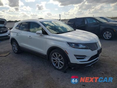 Czwarte zdjęcie samochodu z boku: 2015 LINCOLN MKC VIN:5LMCJ1A94FUJ19967 - miniatura