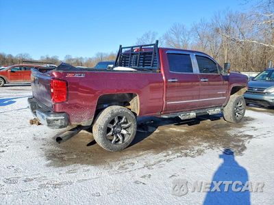 Trzecie zdjęcie samochodu z tyłu: 2016 CHEVROLET SILVERADO K2500 HEAVY DUTY LTZ VIN:1GC1KWE82GF293276 - miniatura