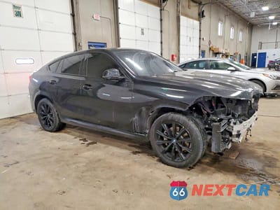 Czwarte zdjęcie samochodu z boku: 2022 BMW X6 XDRIVE40I VIN:5UXCY6C07N9K74981 - miniatura