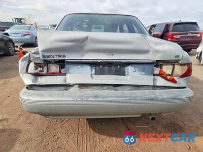 Zdjęcie 6 z 11 samochodu: 1993 NISSAN SENTRA E VIN:1N4EB32A6PC811761 - miniatura