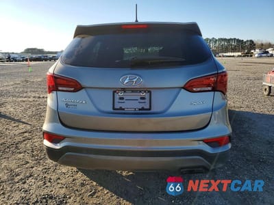 Zdjęcie 6 z 12 samochodu: 2018 HYUNDAI SANTA FE SPORT VIN:5NMZT3LB7JH080119 - miniatura