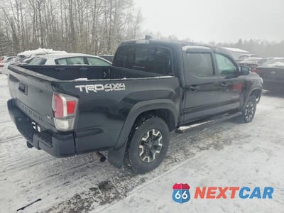 Trzecie zdjęcie samochodu z tyłu: 2020 TOYOTA TACOMA DOUBLE CAB VIN:5TFCZ5AN1LX244214 - miniatura