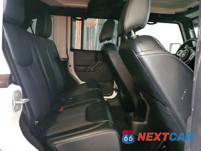 Zdjęcie 11 z 12 samochodu: 2015 JEEP WRANGLER UNLIMITED SAHARA VIN:1C4BJWEG1FL643527 - miniatura