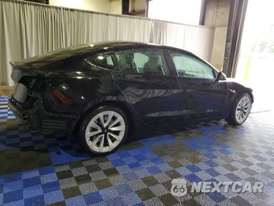Trzecie zdjęcie samochodu z tyłu: 2022 TESLA MODEL 3 VIN:5YJ3E1EA5NF370634 - miniatura