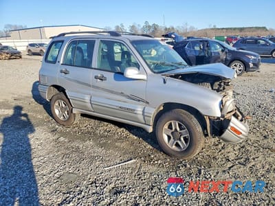 Czwarte zdjęcie samochodu z boku: 2003 CHEVROLET TRACKER LT VIN:2CNBJ634836900241 - miniatura