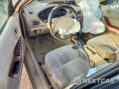 Zdjęcie 8 z 13 samochodu: 2000 MITSUBISHI GALANT ES VIN:4A3AA46G2YE093029 - miniatura