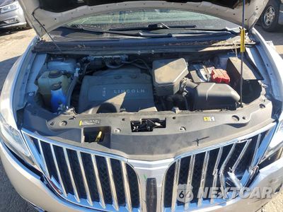 Zdjęcie 12 z 13 samochodu: 2015 LINCOLN MKX VIN:2LMDJ6JK4FBL24979 - miniatura