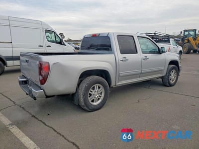 Trzecie zdjęcie samochodu z tyłu: 2011 GMC CANYON SLE VIN:1GTH6MFEXB8106083 - miniatura
