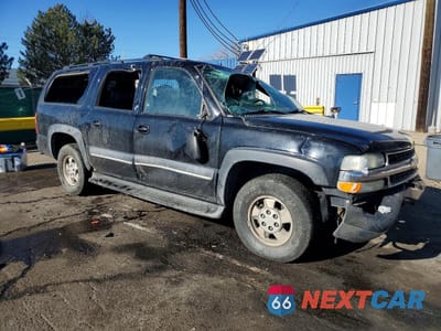 Czwarte zdjęcie samochodu z boku: 2002 CHEVROLET SUBURBAN K1500 VIN:3GNFK16Z72G316601 - miniatura