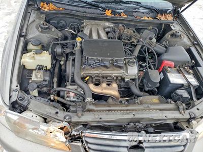 Zdjęcie 11 z 12 samochodu: 2000 TOYOTA CAMRY LE VIN:4T1BF28K7YU102730 - miniatura
