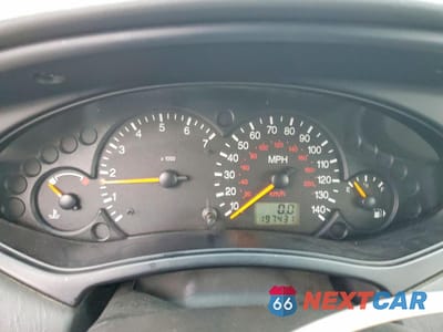 Zdjęcie 9 z 13 samochodu: 2000 FORD FOCUS ZX3 VIN:3FAFP3139YR241671 - miniatura