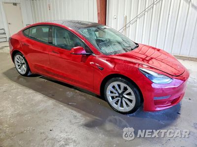 Czwarte zdjęcie samochodu z boku: 2022 TESLA MODEL 3 VIN:5YJ3E1EA3NF371877 - miniatura