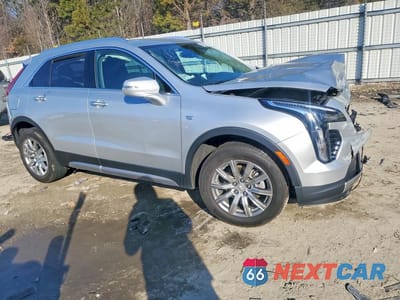 Czwarte zdjęcie samochodu z boku: 2022 CADILLAC XT4 PREMIUM LUXURY VIN:1GYFZDR47NF131101 - miniatura