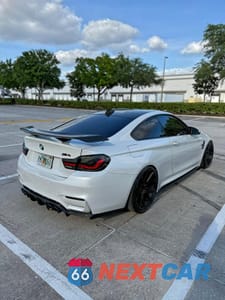 Czwarte zdjęcie samochodu z boku: 2015 BMW M4 VIN:WBS3R9C50FK332153 - miniatura
