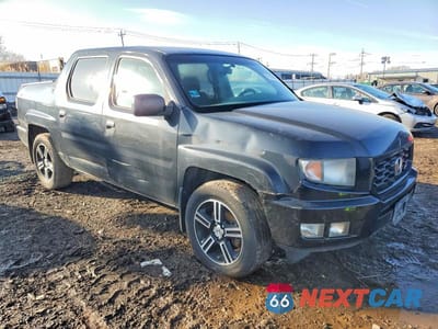 Czwarte zdjęcie samochodu z boku: 2012 HONDA RIDGELINE SPORT VIN:5FPYK1F72CB455579 - miniatura