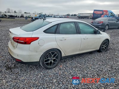 Trzecie zdjęcie samochodu z tyłu: 2017 FORD FOCUS SEL VIN:1FADP3H26HL249004 - miniatura