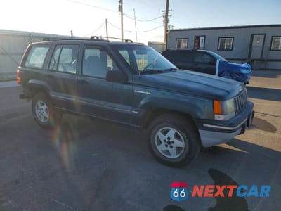 Czwarte zdjęcie samochodu z boku: 1993 JEEP GRAND CHEROKEE VIN:1J4GZ68SXPC582043 - miniatura