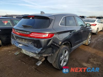 Trzecie zdjęcie samochodu z tyłu: 2017 LINCOLN MKC PREMIERE VIN:5LMCJ1C91HUL24064 - miniatura