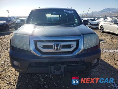 Piąte zdjęcie samochodu w środku: 2011 HONDA PILOT EXL VIN:5FNYF4H51BB085878 - miniatura