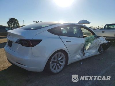 Trzecie zdjęcie samochodu z tyłu: 2022 TESLA MODEL 3 VIN:5YJ3E1EA5NF173981 - miniatura