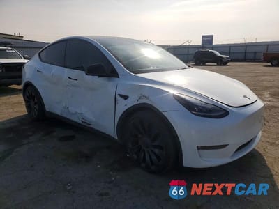 Czwarte zdjęcie samochodu z boku: 2022 TESLA MODEL Y VIN:7SAYGDEFXNF568576 - miniatura