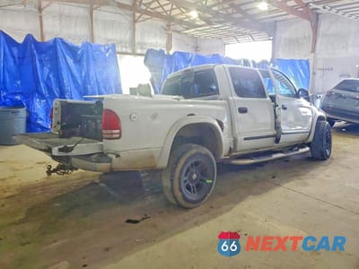 Trzecie zdjęcie samochodu z tyłu: 2004 DODGE DAKOTA QUAD SLT VIN:1D7HG48N44S692060 - miniatura