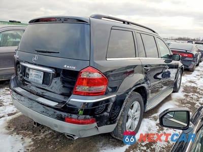 Trzecie zdjęcie samochodu z tyłu: 2009 MERCEDES-BENZ GL 450 4MATIC VIN:4JGBF71E99A441400 - miniatura