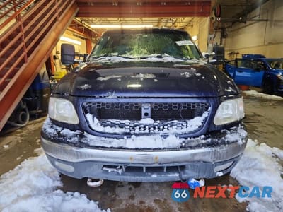 Piąte zdjęcie samochodu w środku: 1999 FORD F150 VIN:1FTRX18LXXNB58401 - miniatura