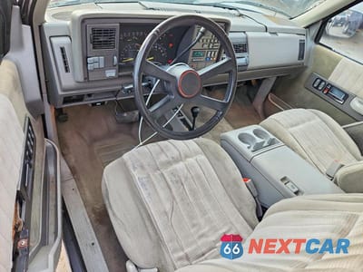 Zdjęcie 8 z 11 samochodu: 1992 GMC SIERRA K1500 VIN:1GTEK14K5NZ512910 - miniatura
