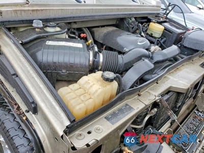 Zdjęcie 12 z 13 samochodu: 2004 HUMMER H2 VIN:5GRGN23U04H102723 - miniatura