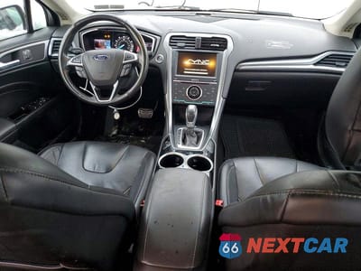 Zdjęcie 8 z 13 samochodu: 2013 FORD FUSION TITANIUM VIN:3FA6P0D94DR189858 - miniatura