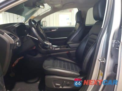 Zdjęcie 7 z 13 samochodu: 2023 FORD EDGE SEL VIN:2FMPK4J90PBA34201 - miniatura