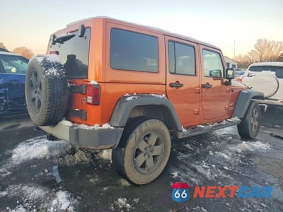 Trzecie zdjęcie samochodu z tyłu: 2011 JEEP WRANGLER UNLIMITED SAHARA VIN:1J4HA5H1XBL572649 - miniatura