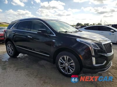 Czwarte zdjęcie samochodu z boku: 2021 CADILLAC XT5 PREMIUM LUXURY VIN:1GYKNCRS0MZ173433 - miniatura