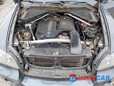 Zdjęcie 12 z 14 samochodu: 2013 BMW X5 XDRIVE35I VIN:5UXZV4C59D0B11368 - miniatura