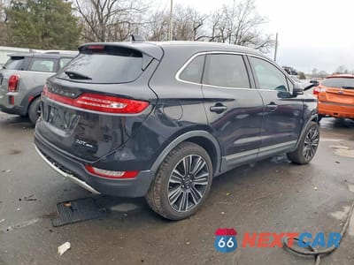 Trzecie zdjęcie samochodu z tyłu: 2017 LINCOLN MKC BLACK LABEL VIN:5LMCJ4D92HUL31136 - miniatura