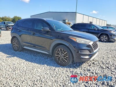 Czwarte zdjęcie samochodu z boku: 2020 HYUNDAI TUCSON LIMITED VIN:KM8J33AL5LU145632 - miniatura
