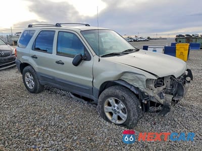 Czwarte zdjęcie samochodu z boku: 2006 FORD ESCAPE XLT VIN:1FMYU93136KA60699 - miniatura