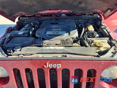 Zdjęcie 11 z 12 samochodu: 2012 JEEP WRANGLER UNLIMITED SAHARA VIN:1C4BJWEGXCL173008 - miniatura