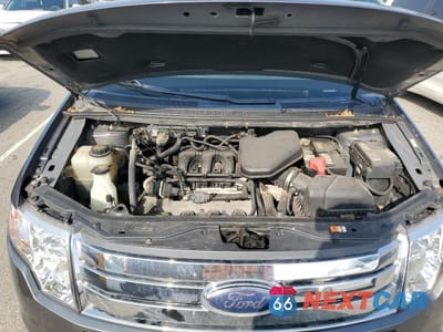 Zdjęcie 12 z 13 samochodu: 2010 FORD EDGE SEL VIN:2FMDK4JC0ABB59852 - miniatura