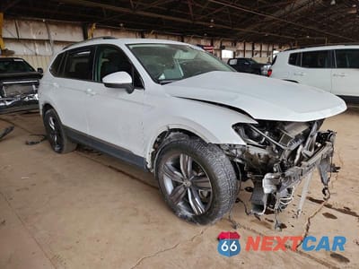 Czwarte zdjęcie samochodu z boku: 2020 VOLKSWAGEN TIGUAN SE VIN:3VV3B7AX0LM107919 - miniatura
