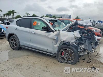 Czwarte zdjęcie samochodu z boku: 2022 ALFA ROMEO STELVIO TI VIN:ZASPAKBN0N7D46121 - miniatura